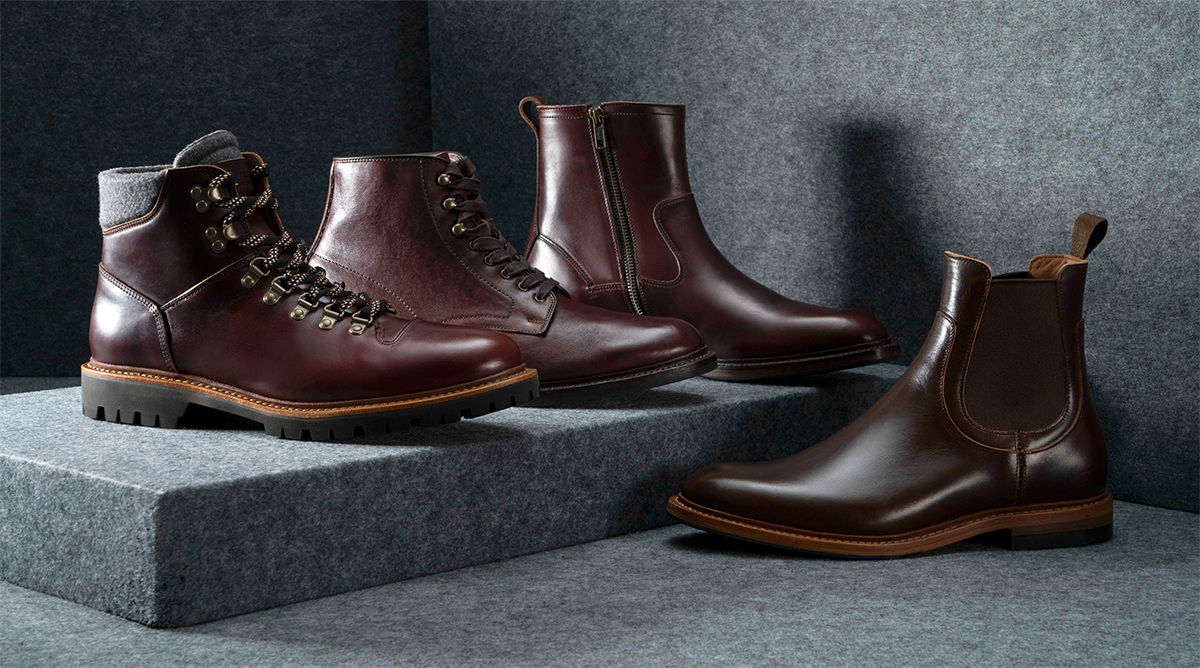 Four different styles of men’s boots, including a hiking boot, lace-up boot, zip-up boot, and a Chelsea boot. Each boot is made from burgundy leather.Quatre styles différents de bottes pour hommes, dont une botte de randonnée, une botte à lacets, une botte zippée et une botte Chelsea. Chaque botte est fabriquée en cuir bordeaux.