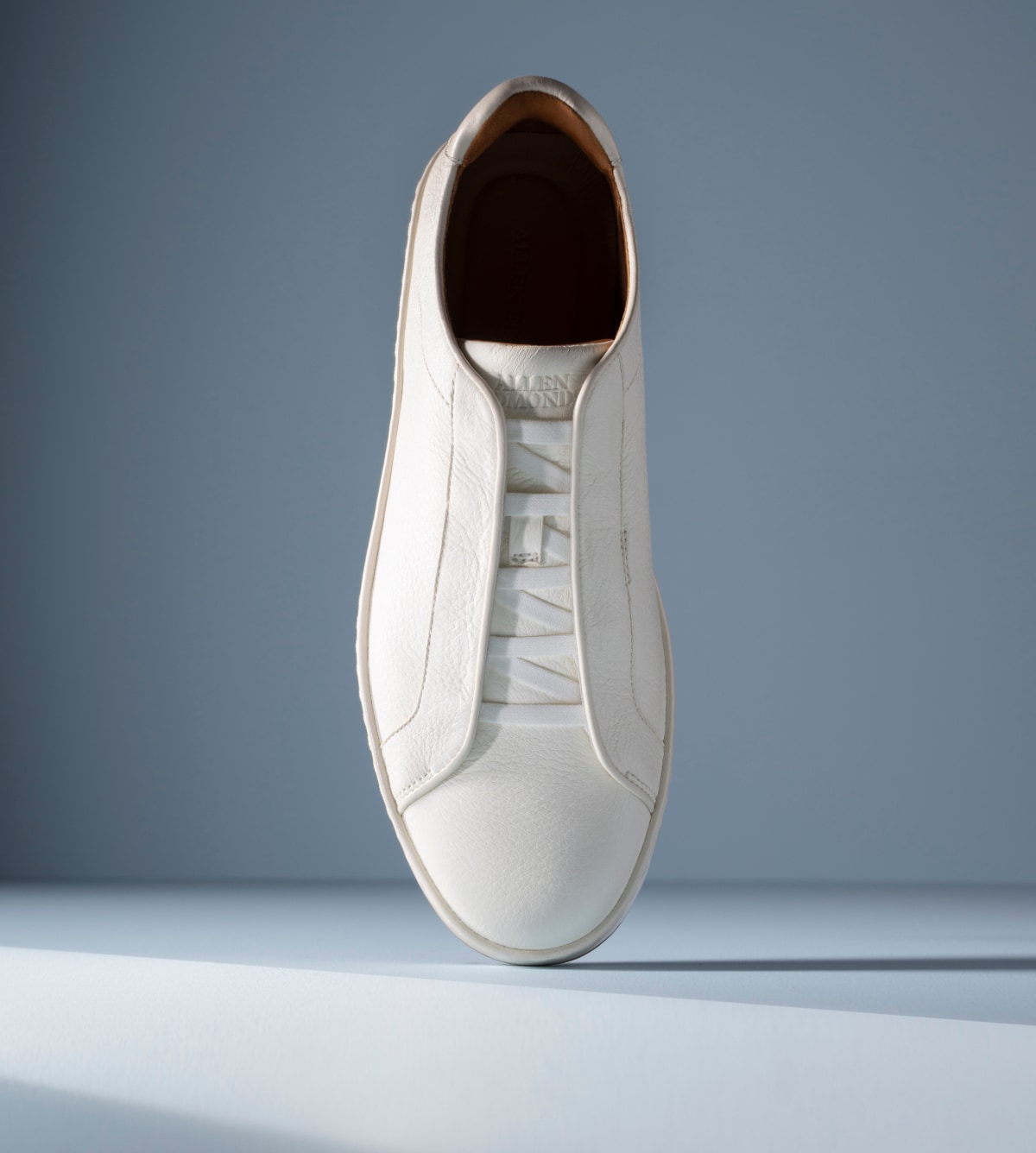 White leather Banks Court slip-on sneaker with stretch laces and tan leather collar 
